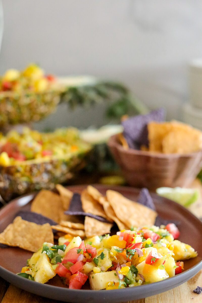 Salsa made with pineapple and in a Pineapple rind bowl
