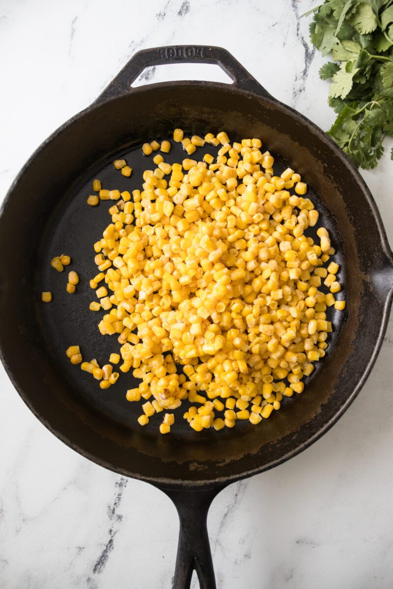 Traditional Mexican Street corn made in a non traditional way. Using a cast iron skillet.