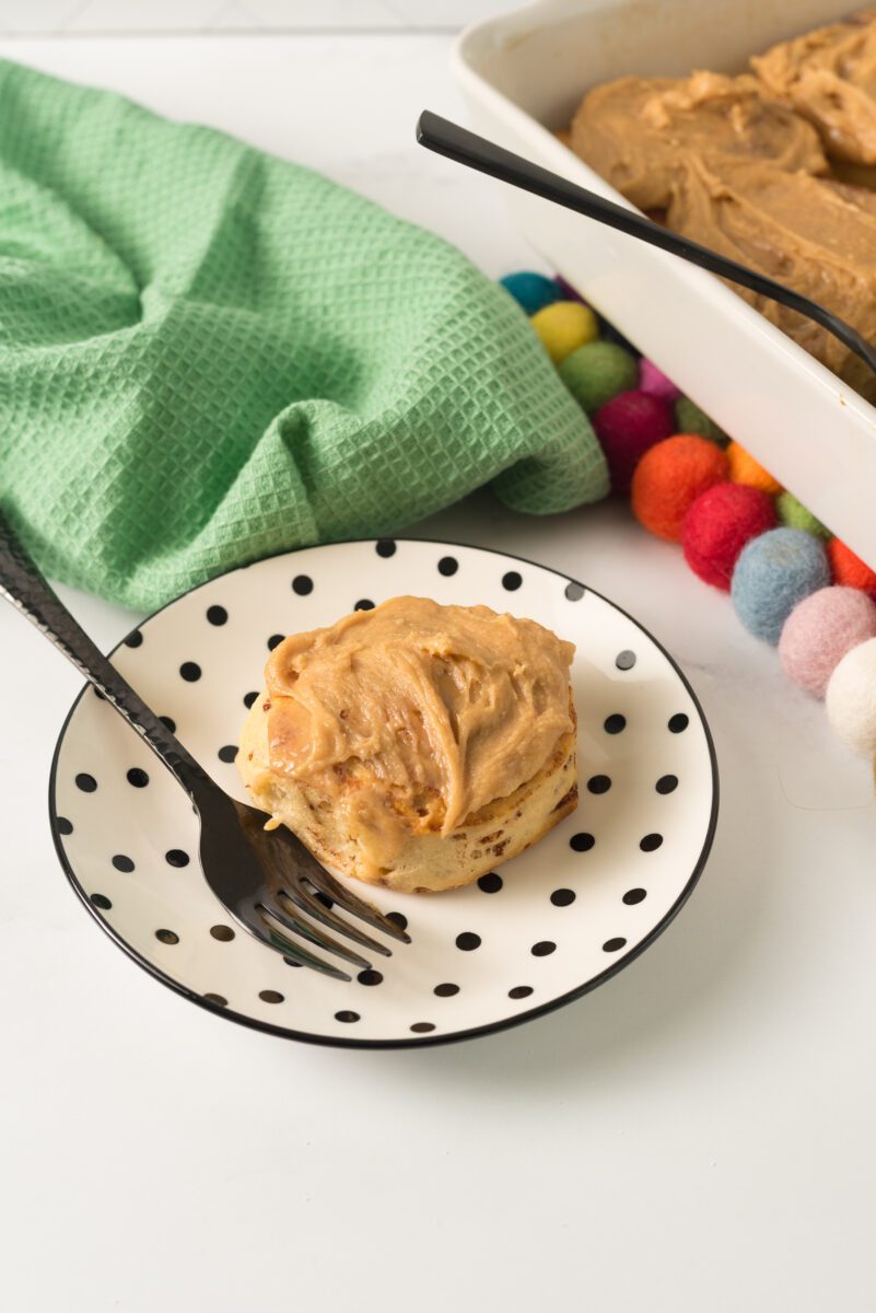 Store bought cinnamon rolls with a homemade peanut butter topping